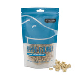 A package of The Treatery's Banana & Peanut Butter dog cookies with several cookies displayed in front.