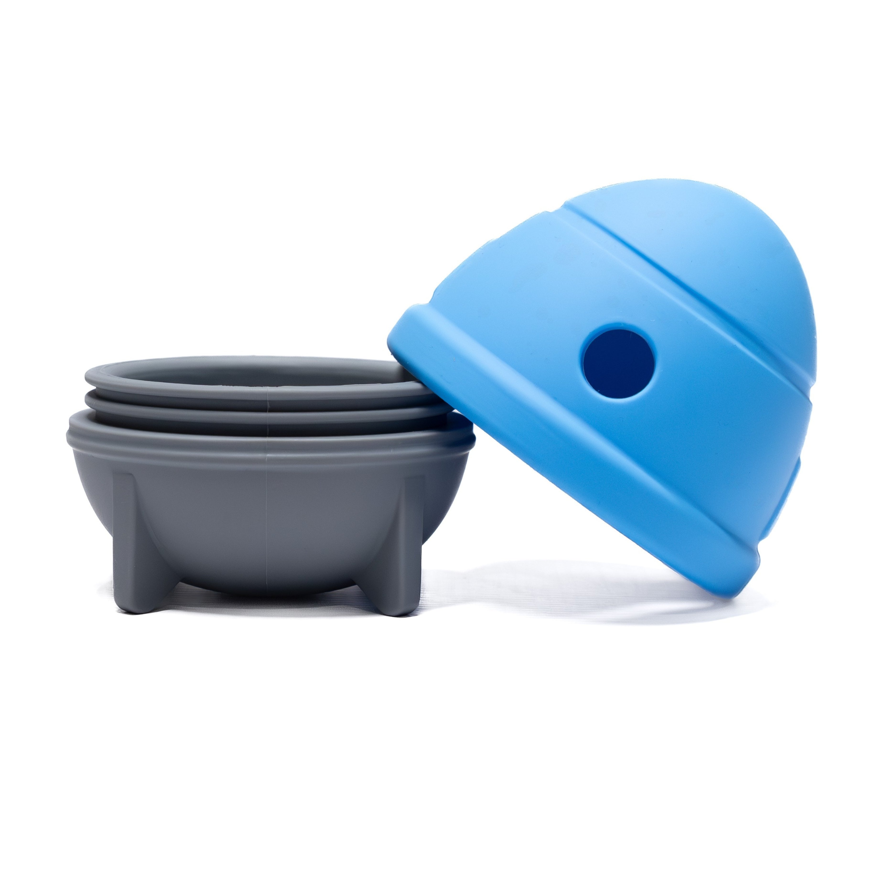 Blue and grey Rocket Wobbler Treat Dispenser toy shown open for easy filling and cleaning.
