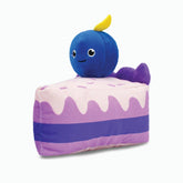 HugSmart Blueberry Cake Plush Dog Toy with cute blueberry topper and purple icing design.