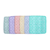 Lineup of pastel-colored Flower Slow Feeder Enrichment Bowls designed to promote healthy eating habits for dogs.