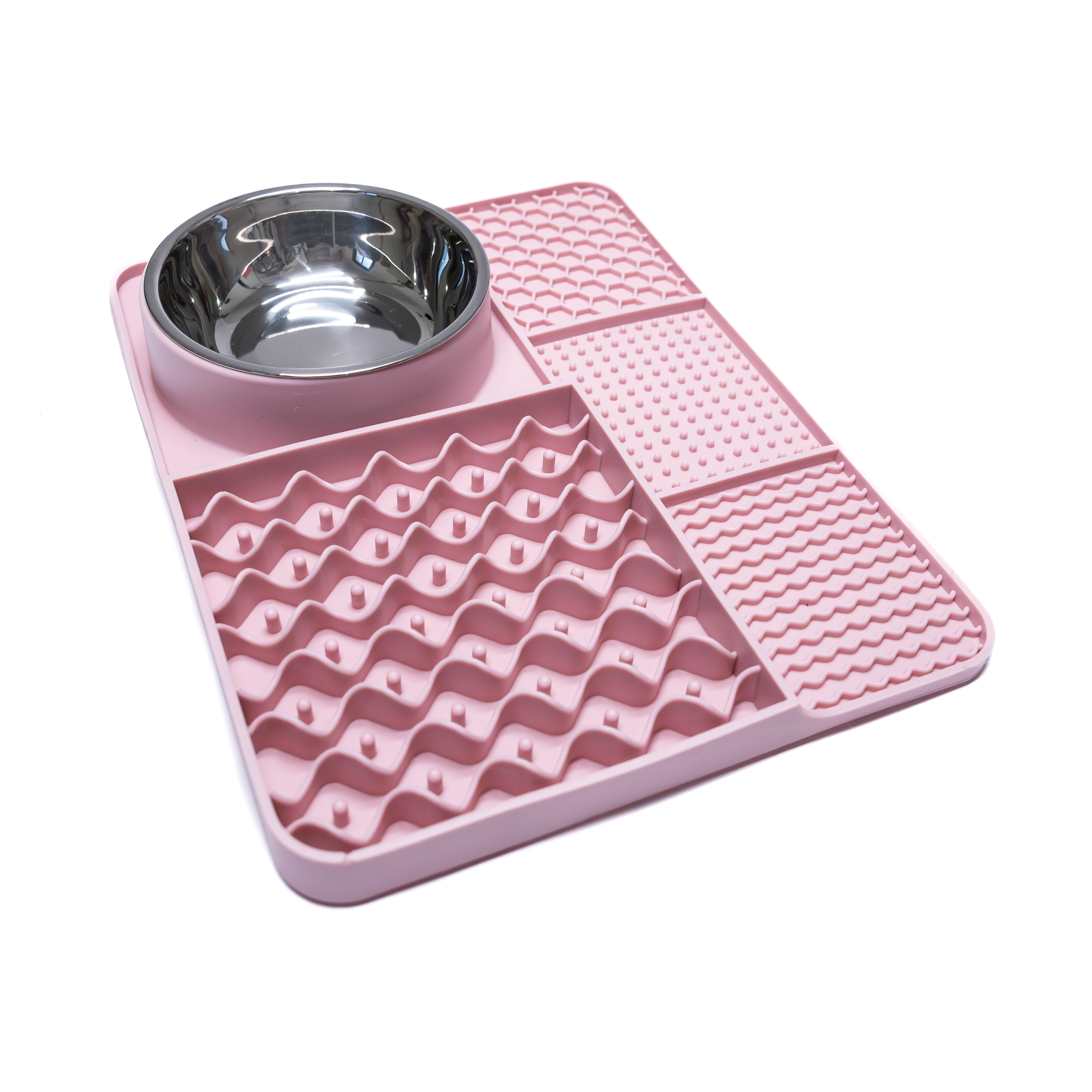 Side view of pink Lick and Feast Slow Feeder Mat showing raised textured patterns for slow feeding and anxiety reduction.