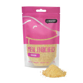 A pink package of 'The Treatery' brand Chicken Enricher Protein, designed as a meal enhancer for dogs. The package displays the product name and image of the chicken protein powder.