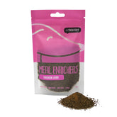 A package of 'The Treatery' brand Chicken Liver Meal Enricher for dogs, showing a clear window with the product powder visible inside, against a white background.