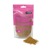 Fish Protein Meal Topper Blend for Dogs sprinkled over meal for picky eaters