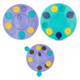 ZippyPaws Smartypaws puzzle feeder for dogs in teal and purple promotes slow feeding and interactive play.