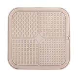 Beige FourZone Slow Feeder Mat for dogs featuring bone and droplet textures for interactive feeding and mental stimulation.