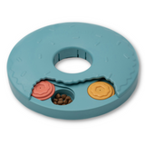 Blue ZippyPaws Donut Slider interactive dog toy showing hidden treat compartments for enrichment and boredom relief.