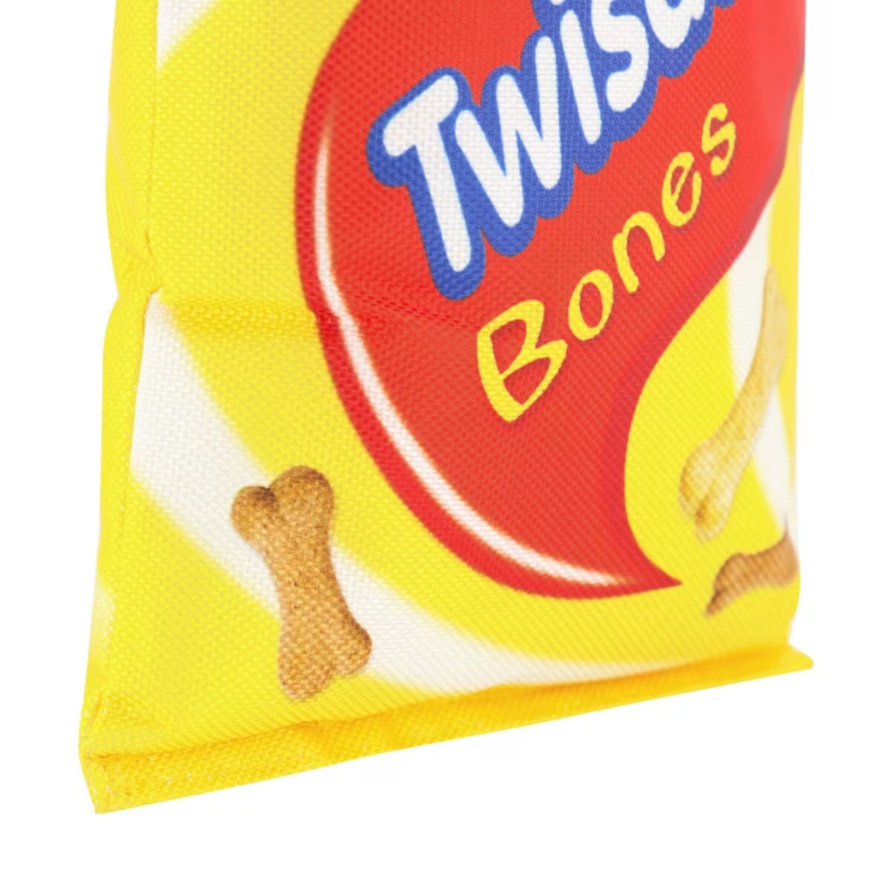 Close-up of Twistdogs Pet Plush Toy bottom corner with printed bone pattern.