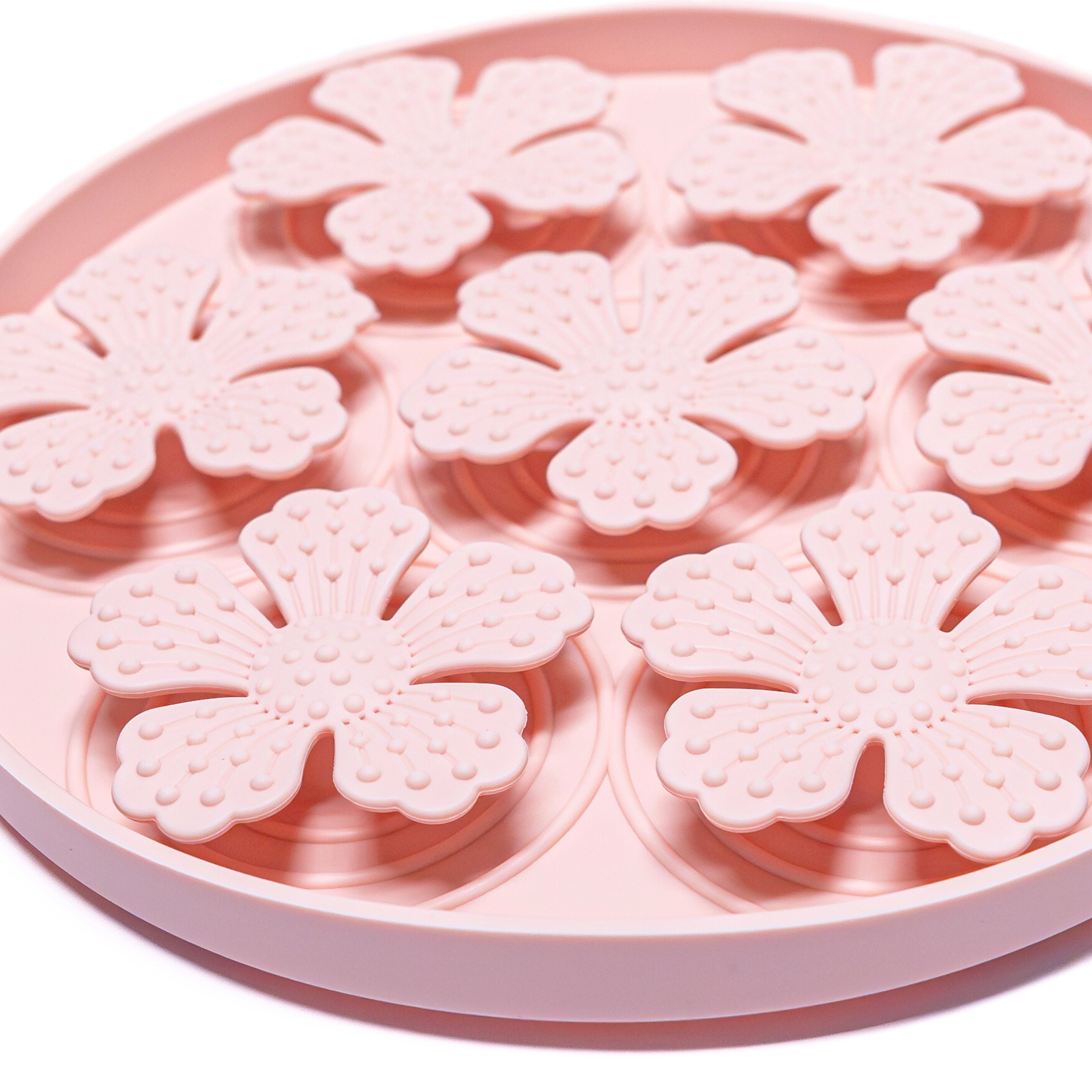 Close-up of pink Flower Slow Feeder Bowl showing raised petal textures that enhance licking enrichment for calm feeding.
