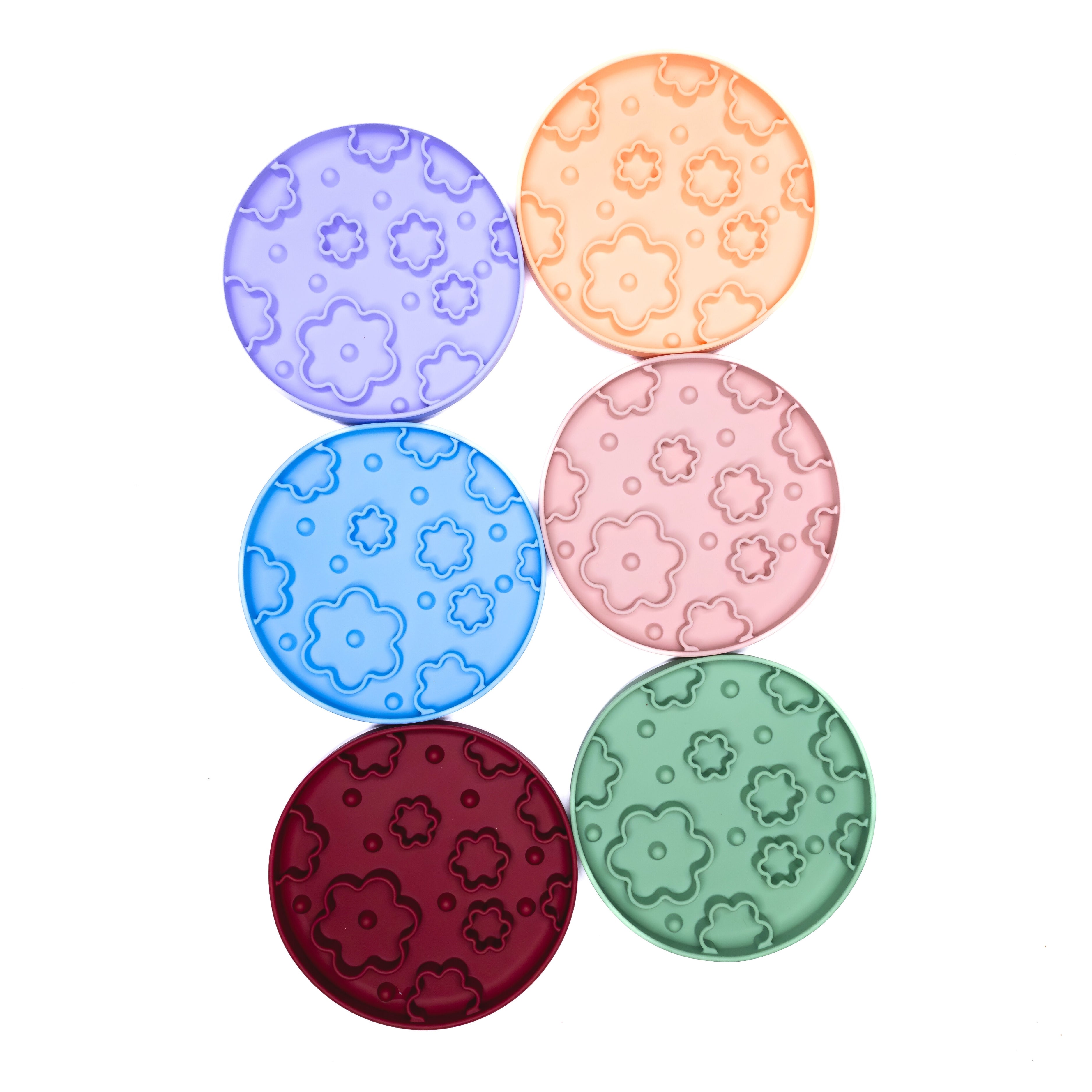 Colorful range of Flower Power Slow Feeder Enrichment Bowls for dogs encouraging slower eating and mental stimulation.