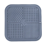 Dark gray FourZone Slow Feeder Mat featuring four unique textured sections to promote calm feeding and reduce gulping in dogs.