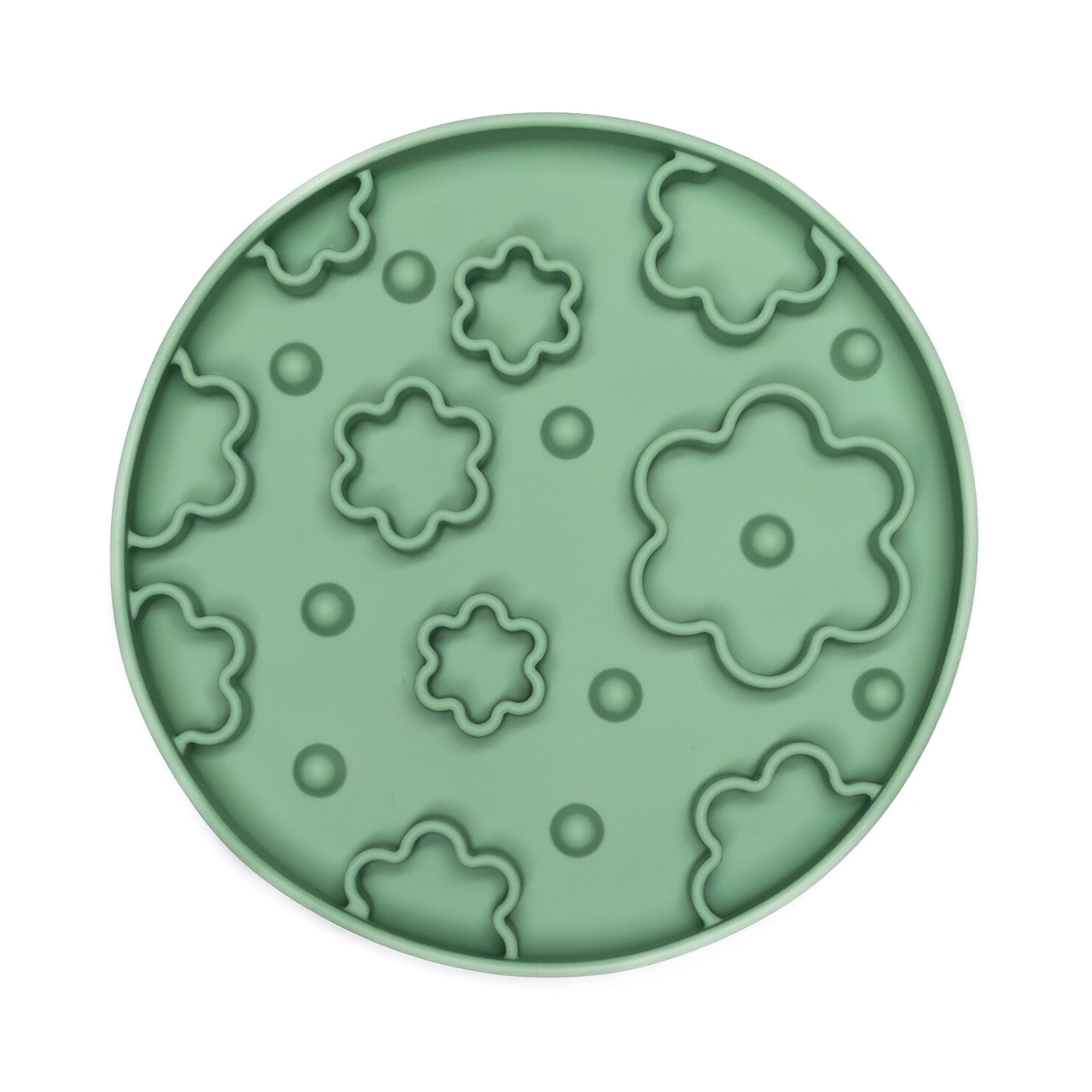 Green Flower Power Slow Feeder Bowl with flower-shaped ridges promoting slower feeding and reducing anxiety during meals.
