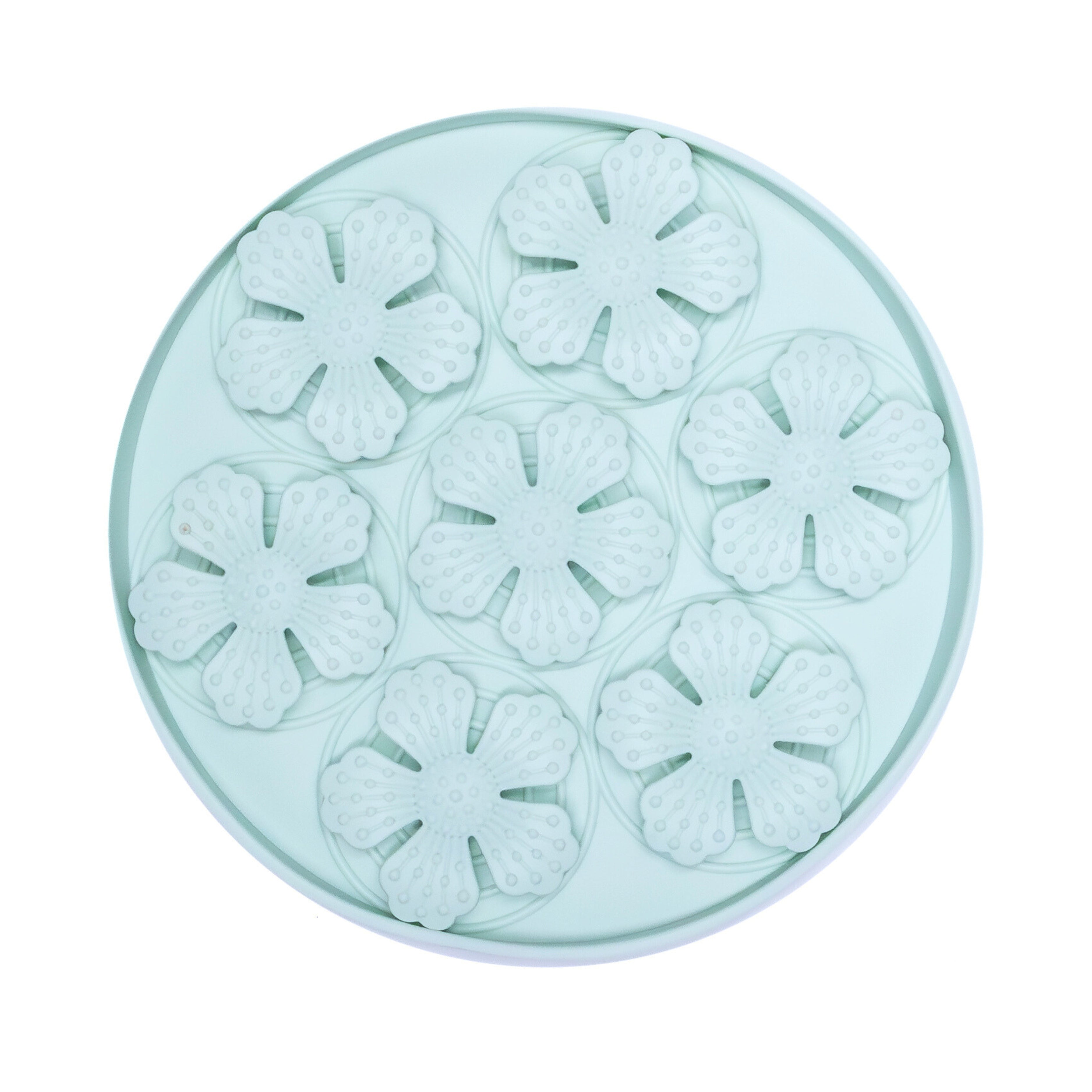 Mint green Flower Slow Feeder Bowl with raised floral texture helping dogs eat slower and stay relaxed during meals.