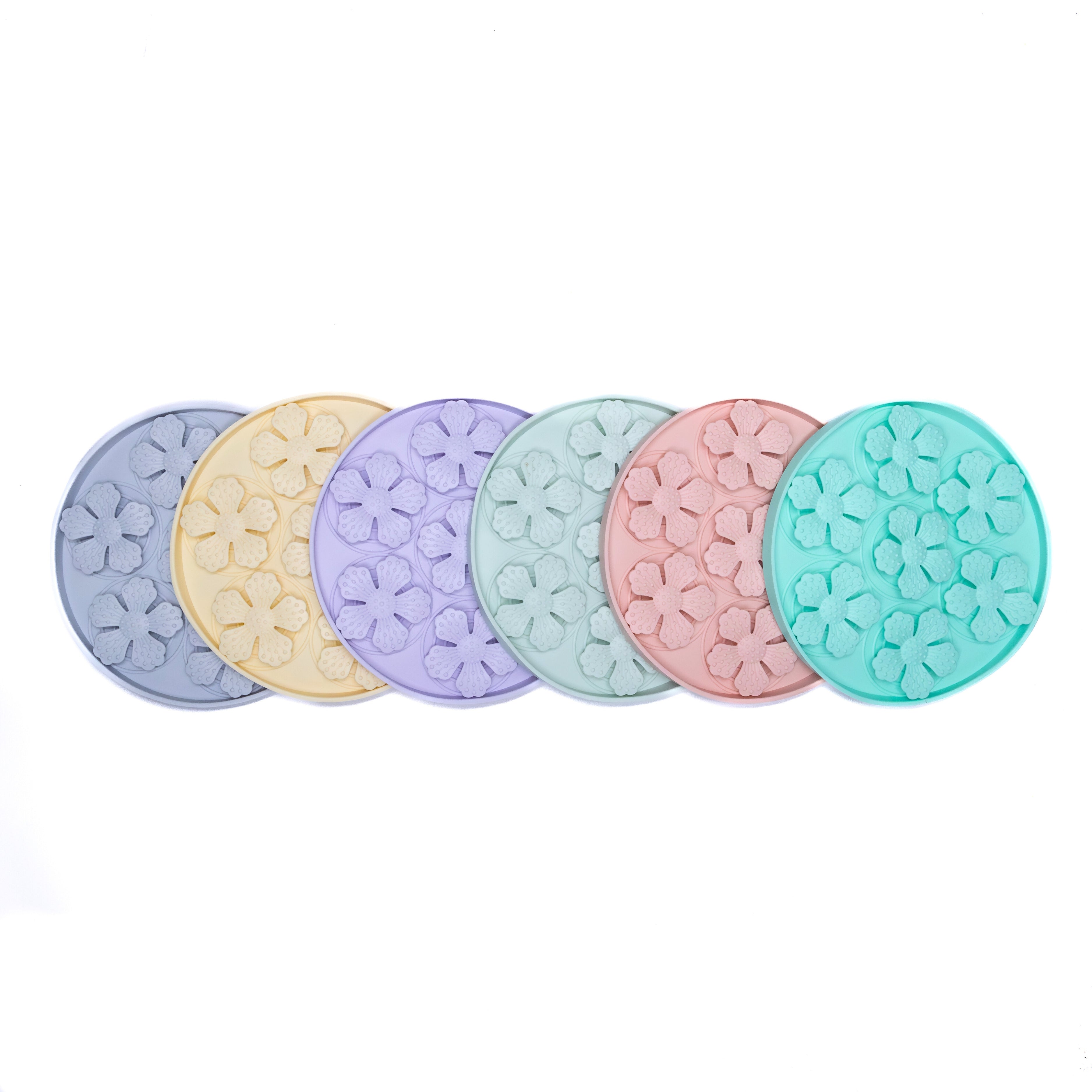 Pastel-colored Flower Slow Feeder Enrichment Bowls designed to promote slow feeding and interactive mealtime for dogs.