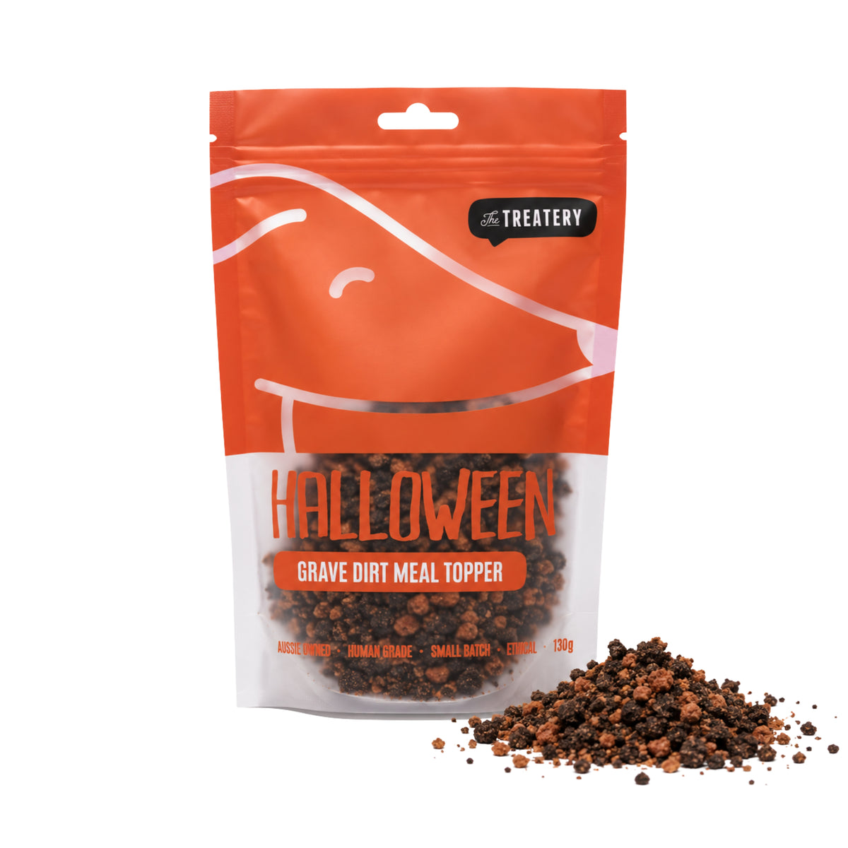 Packaging of Grave Dirt Halloween dog meal topper from The Treatery, with dark baked cookie crumble displayed in front.